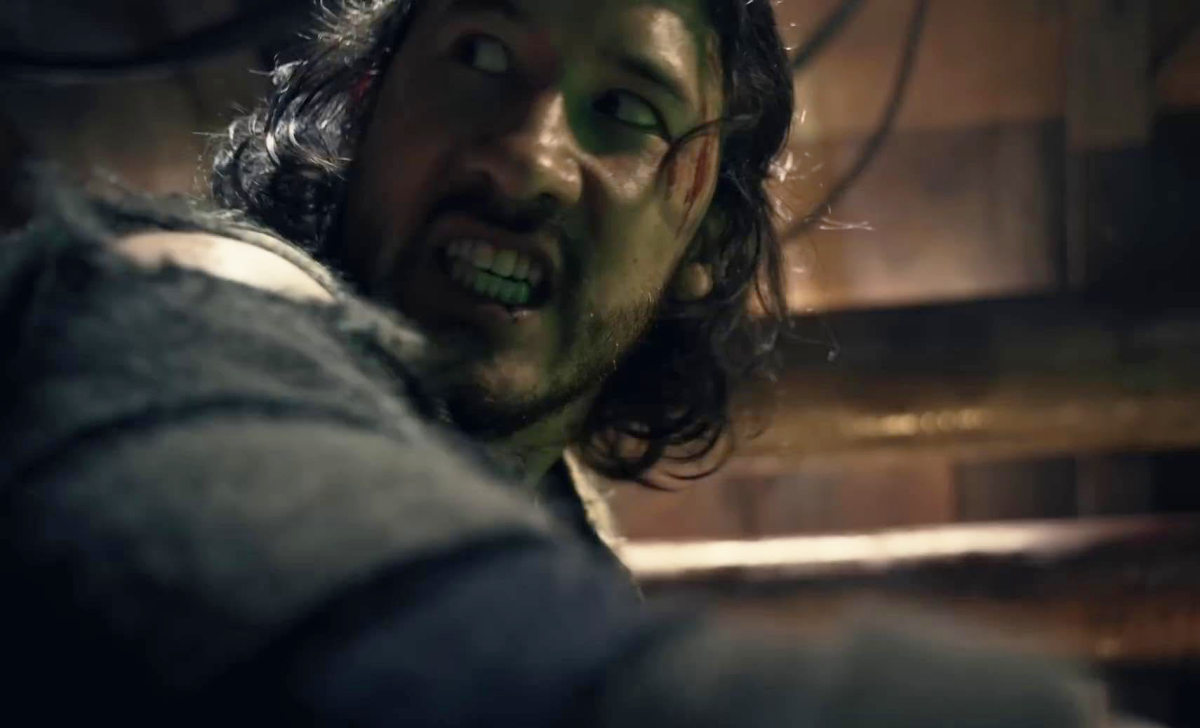 Image shows main character Simon, played by YouTube star Markiplier pulling a control in horror film "Iron Lung."