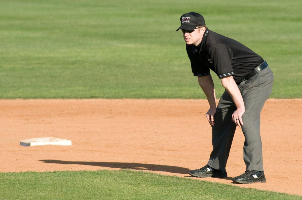 A baseball umpire officiates a game. Courtesy of Mark Mauno