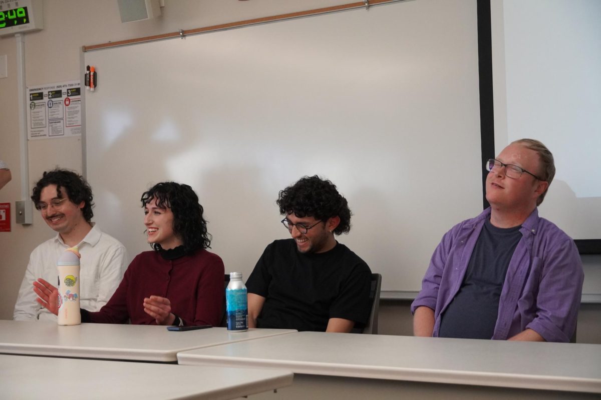 From left, Luis Ybarra, Madison Santos, RJ Rivasplata and Derrick Diamond discuss philosophy.