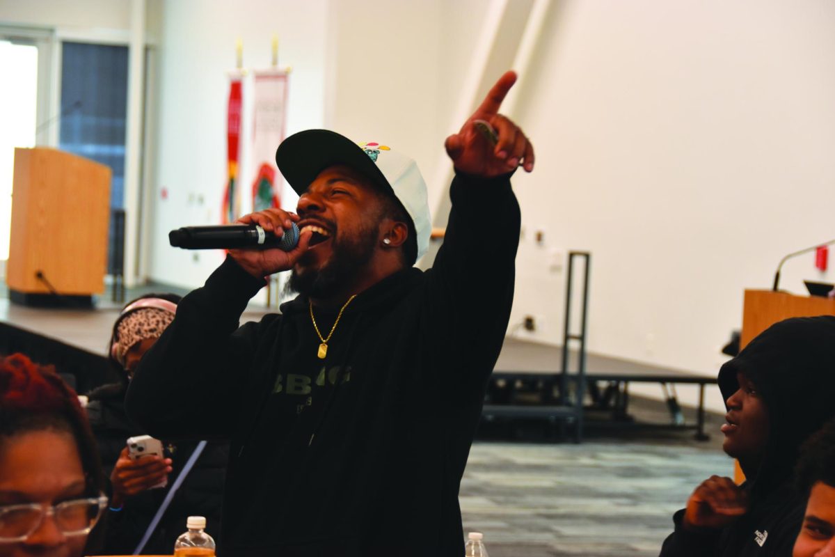 Local high school students sing and dance in the karaoke activity held during Umoja Day April 21 in the Student Union Conference Center.
