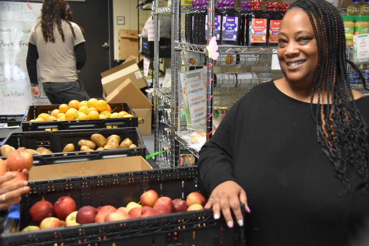 Los Medanos College's Basic Needs Program Coordinator Megela Ohare stands in the LMC Marketplace Wednesday, April 15.
