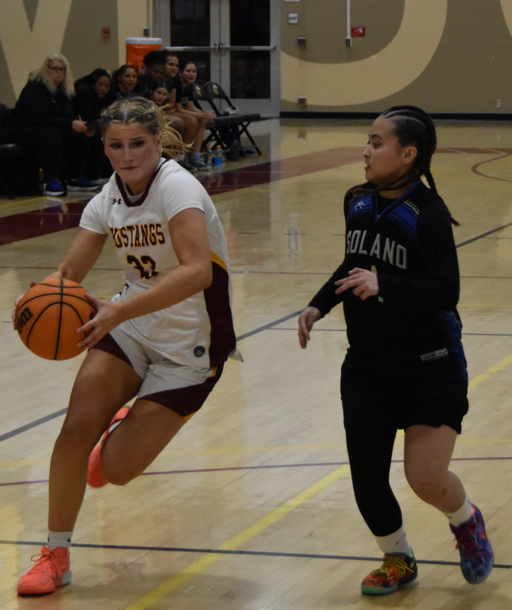No. 23 Kendall McClure drives to the rim in a game vs. Solano.