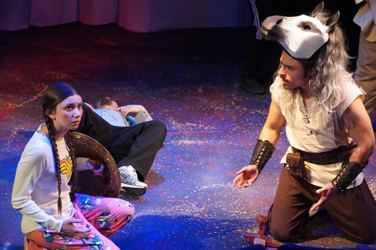 Emme (left) played by Bailey Newman acting out a scene with Artax (Right) played by Raven Figueroa.