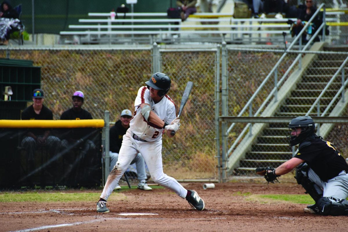 No. 2 center fielder Nate Liddicoat makes a swing in an at bat against a low pitch at home in a 4-3 win against Chabot College Feb. 25.
