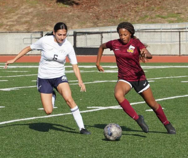 No. 12 Elyse Baldwin beats a defender during the first half of a game against Contra Costa College Nov. 4.